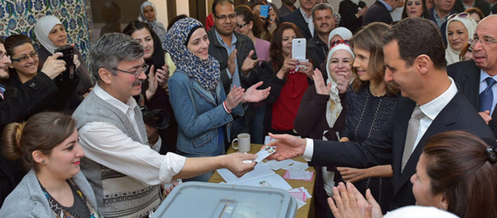 Mr. and Ms. Bashar and Asma Assad cast their votes in 2016.